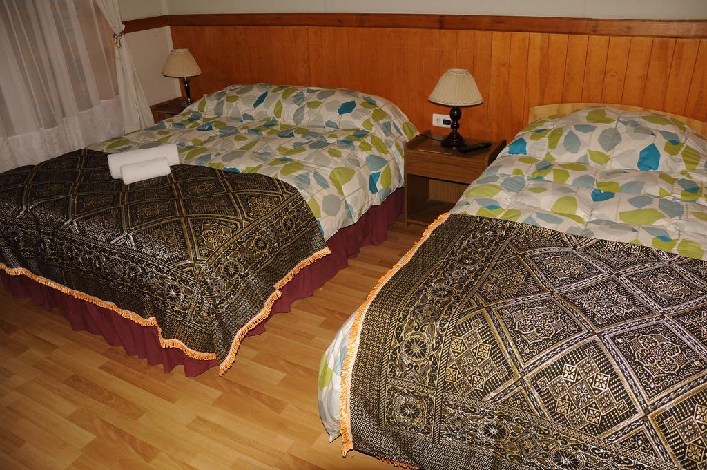 Hostal El Rincon Puerto Natales Zimmer foto
